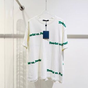 Authentic Louis Vuitton White Tee with Green Text